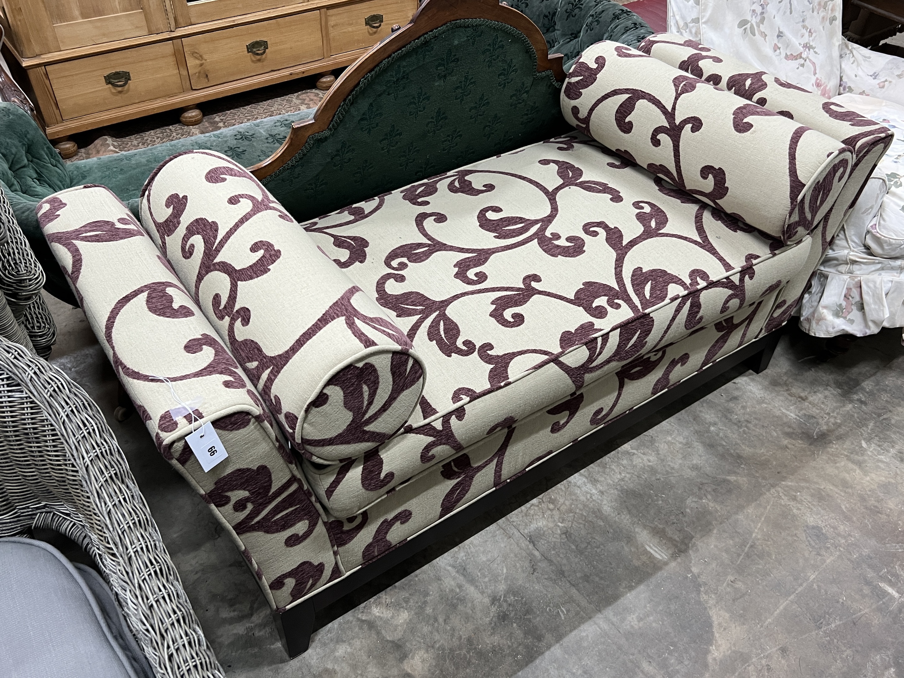 A contemporary upholstered day bed, length 160cm, width 64cm, height 76cm